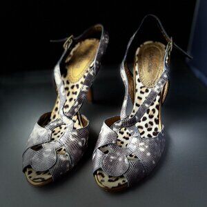 Authentic open-toed Roberto Cavalli shoe with snake-embossed leather.